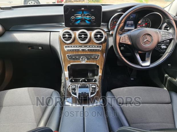Mercedes-Benz C200 2016 - Sleek White Sedan Up for Grabs