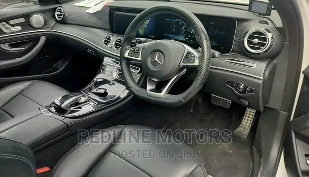Pre-owned 2016 Mercedes-Benz E200 White with Premium Features