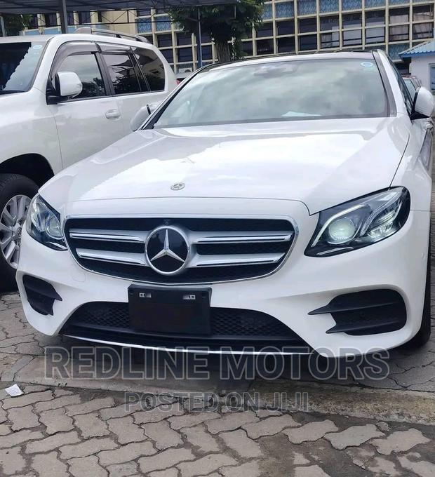 Pre-owned 2016 Mercedes-Benz E200 White with Premium Features