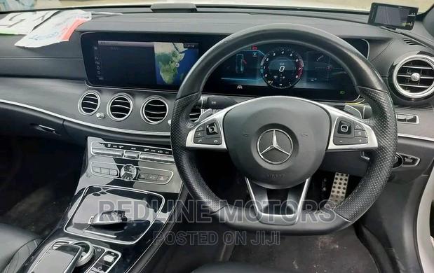 Pre-owned 2016 Mercedes-Benz E200 White with Premium Features