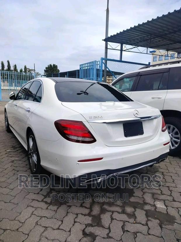 Pre-owned 2016 Mercedes-Benz E200 White with Premium Features