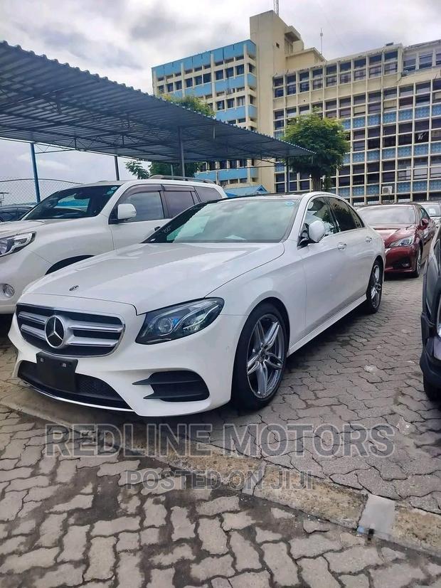 Pre-owned 2016 Mercedes-Benz E200 White with Premium Features