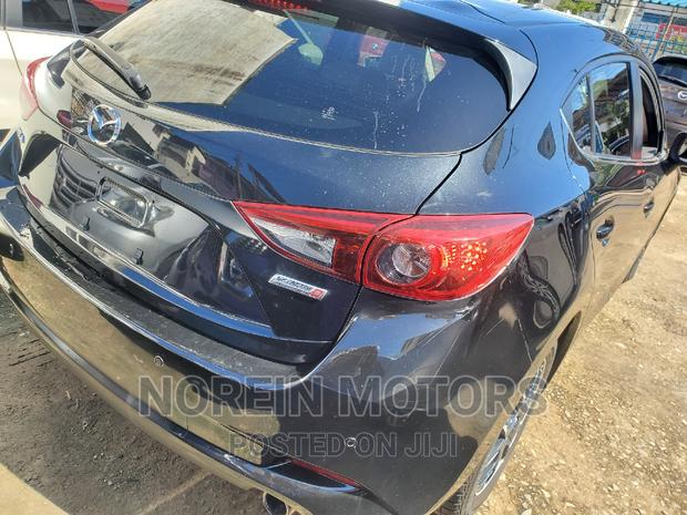 Black 2016 Mazda Axela: Sophisticated and Efficient Sedan