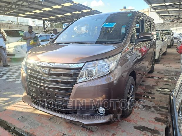 2016 Toyota Noah in Brown: Quality, Spaciousness, and Style