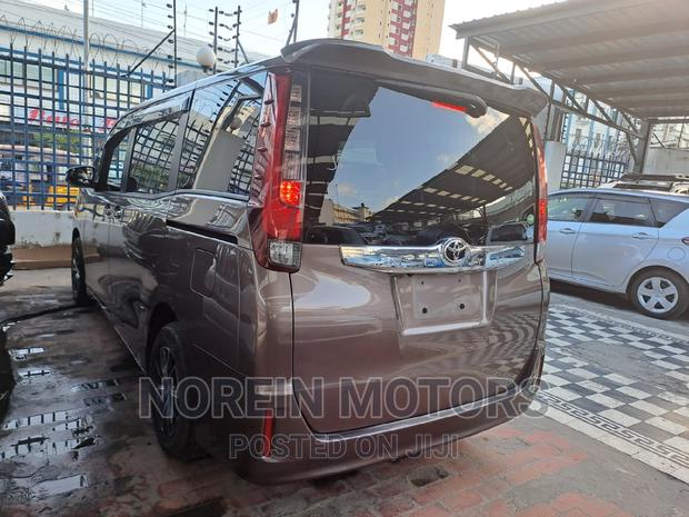 2016 Toyota Noah in Brown: Quality, Spaciousness, and Style
