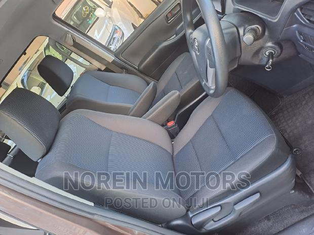 2016 Toyota Noah in Brown: Quality, Spaciousness, and Style
