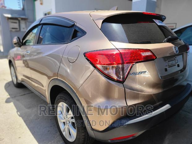 Gold Honda Vezel 2016 - Quality Pre-owned SUV Deal