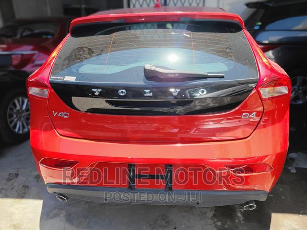 2016 Volvo V40 Red: Luxury Compact Car with Style