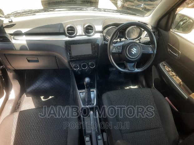 2016 Suzuki Swift in Black: Compact Car with Attitude