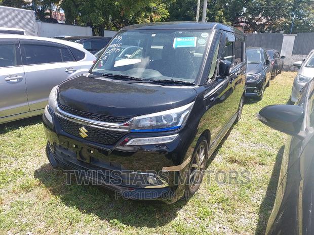Suzuki Solio 2017 Black: Modern Compact Car with Efficient Performance