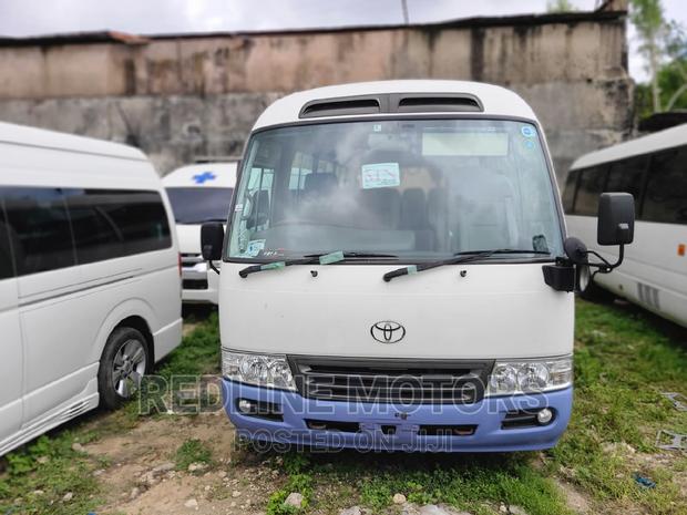 2016 Toyota Coaster White - Affordable Minibus with Multiple Options