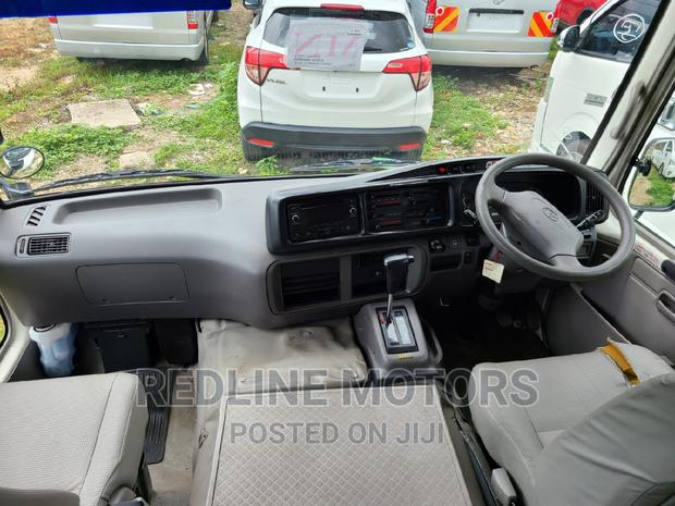 2016 Toyota Coaster White - Affordable Minibus with Multiple Options