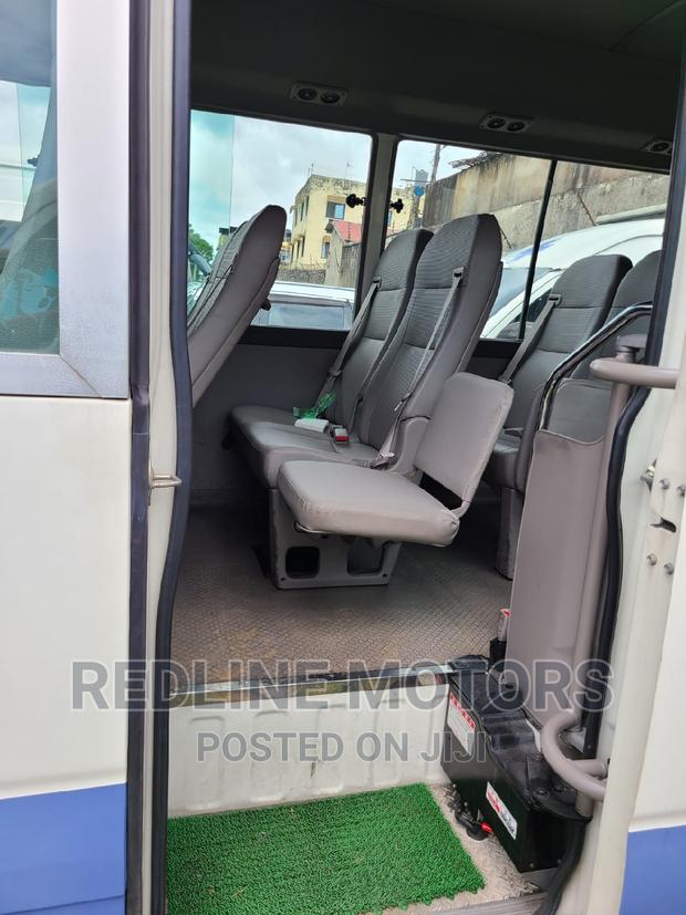 2016 Toyota Coaster White - Affordable Minibus with Multiple Options