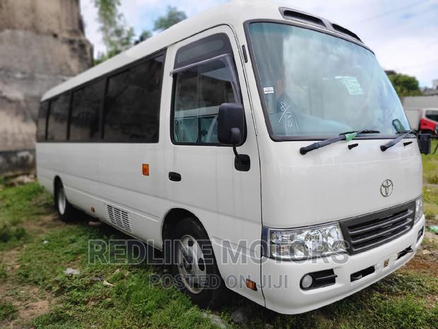 2016 Toyota Coaster Pearl Edition: Comfortable and Durable Minivan for Sale