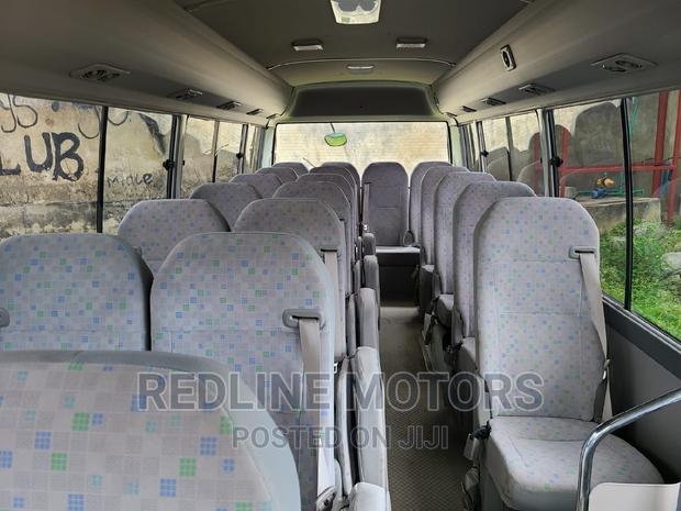 2016 Toyota Coaster Pearl Edition: Comfortable and Durable Minivan for Sale