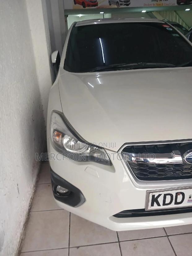 White 2014 Subaru Impreza - A High-Quality, Affordable, and Stylish Ride