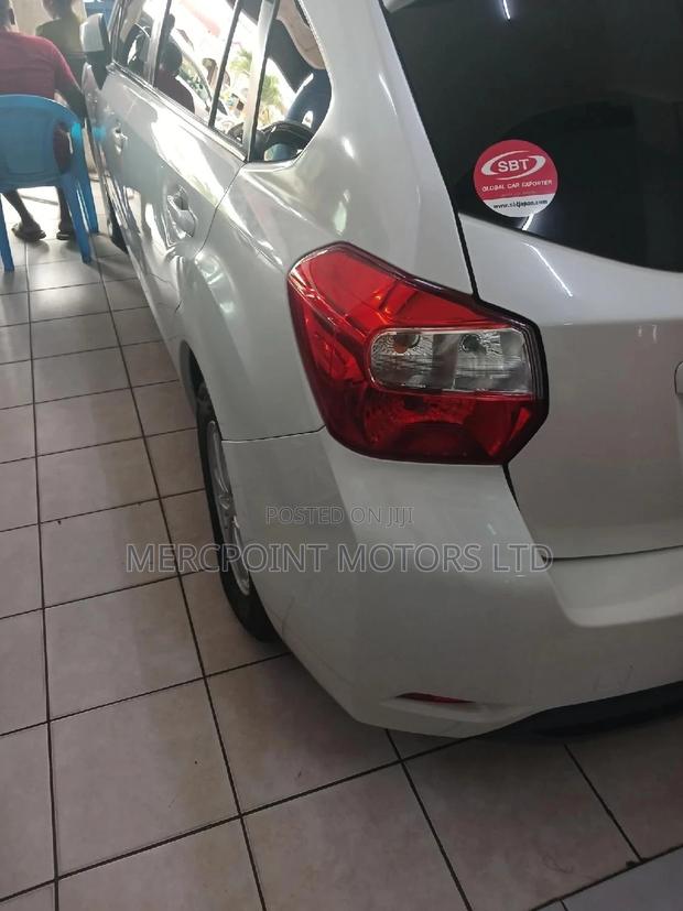 White 2014 Subaru Impreza - A High-Quality, Affordable, and Stylish Ride