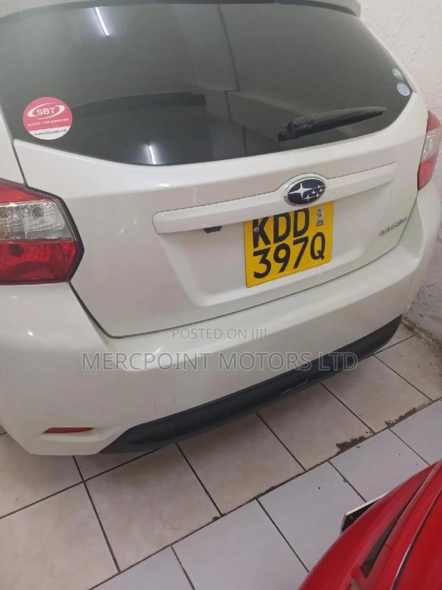 White 2014 Subaru Impreza - A High-Quality, Affordable, and Stylish Ride