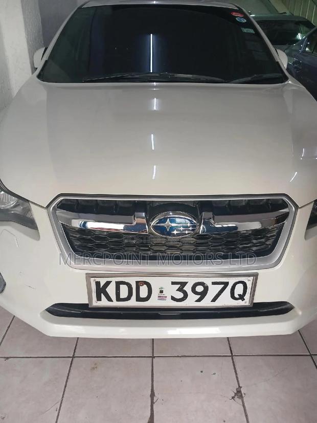 White 2014 Subaru Impreza - A High-Quality, Affordable, and Stylish Ride