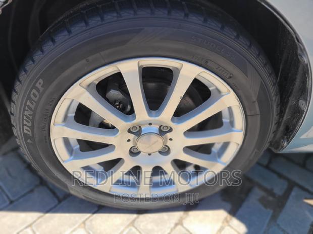 Blue 2016 Toyota Corolla Fielder: Stylish and Reliable SUV