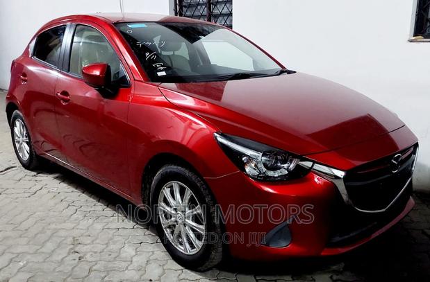 Red Mazda Demio 2017: Compact Car with Style & Efficiency