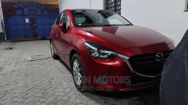 Red Mazda Demio 2017: Compact Car with Style & Efficiency