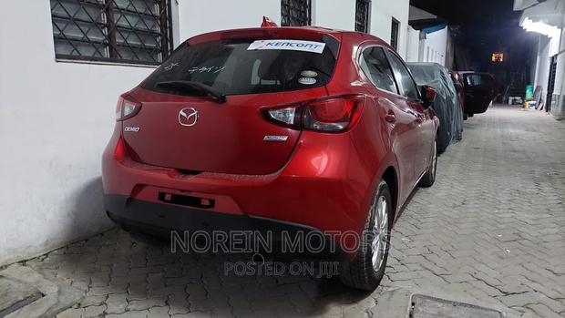 Red Mazda Demio 2017: Compact Car with Style & Efficiency