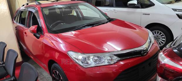 Red Pre-owned 2016 Toyota Corolla Fielder