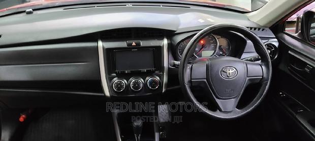 Red Pre-owned 2016 Toyota Corolla Fielder