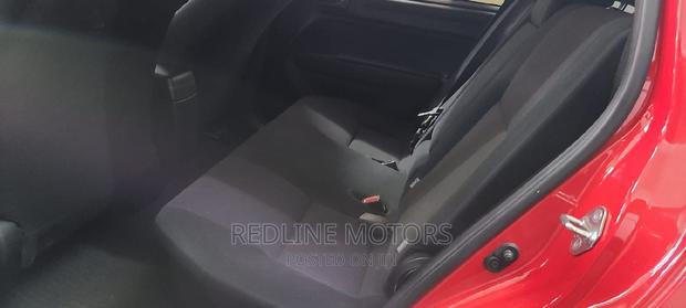 Red Pre-owned 2016 Toyota Corolla Fielder
