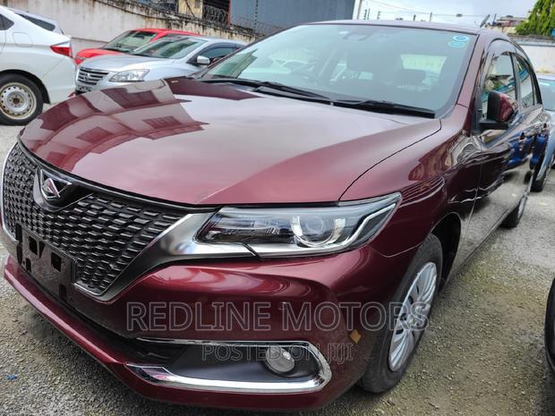 2016 Toyota Allion: Red Sedan, Perfect for Your Commute