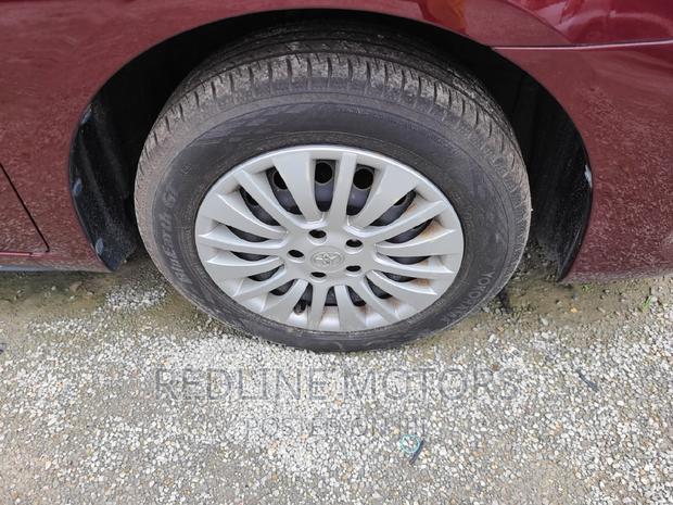 2016 Toyota Allion: Red Sedan, Perfect for Your Commute