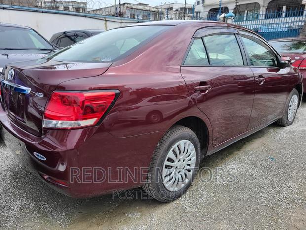 2016 Toyota Allion: Red Sedan, Perfect for Your Commute