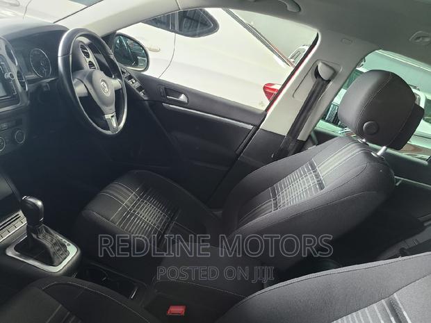 Red 2016 Volkswagen Tiguan: Spacious and Reliable SUV
