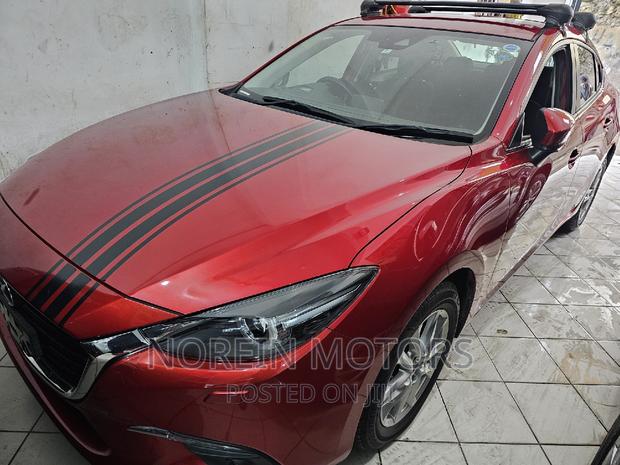 2017 Mazda Axela - Red: Powerful and Efficient Compact Car