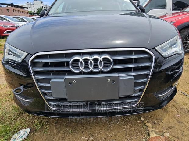2016 Audi A3 Black Sportback: Sophisticated Hatchback with Power & Luxury