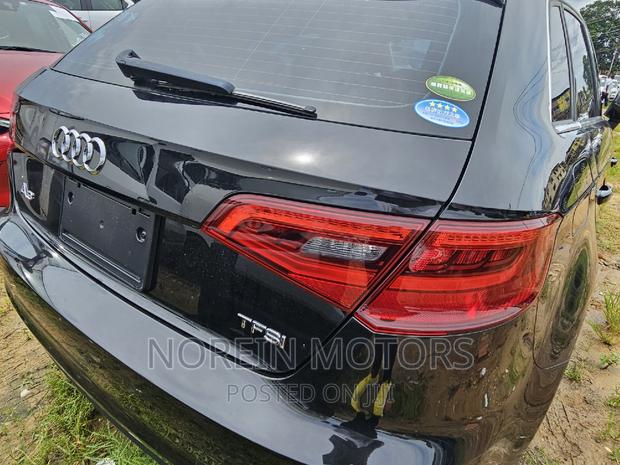 2016 Audi A3 Black Sportback: Sophisticated Hatchback with Power & Luxury