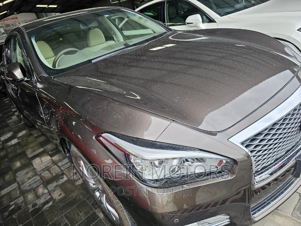 2017 Nissan Fuga Brown Sedan: Stylish & Reliable