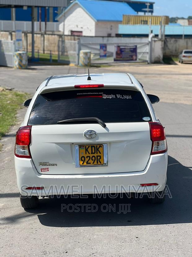 White Toyota Corolla Fielder 2015 - Affordable Luxury Sedan