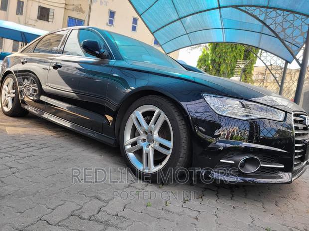 2016 Black Sedan AWD - Sophistication & Speed