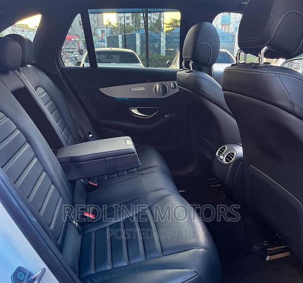 16 is a stunning white SUV with luxury features, premium interior, and advanced technology.