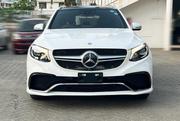 16 is a stunning white SUV with luxury features, premium interior, and advanced technology. for sale
