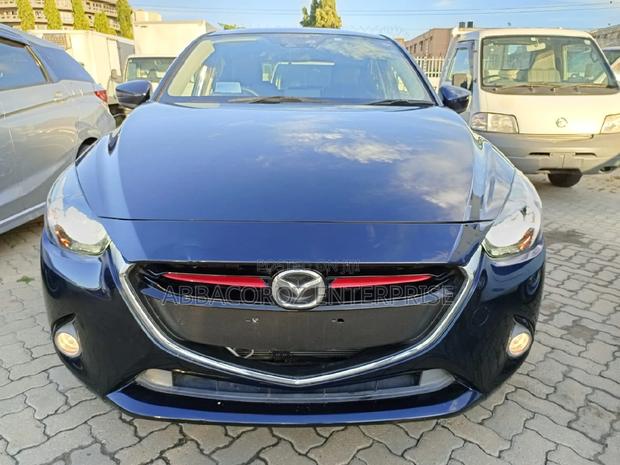 Mazda Demio 2016 Purple: Pre-owned Hatchback with Style and Comfort