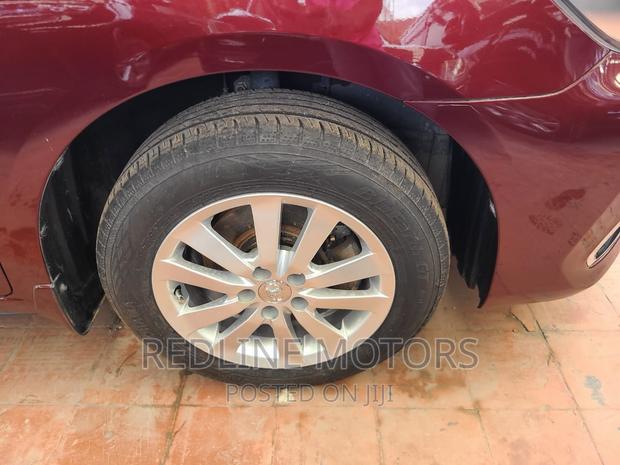 2016 Toyota Premio 1.5L Red FWD - Used with Pride