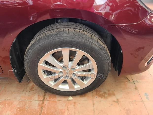 2016 Toyota Premio 1.5L Red FWD - Used with Pride