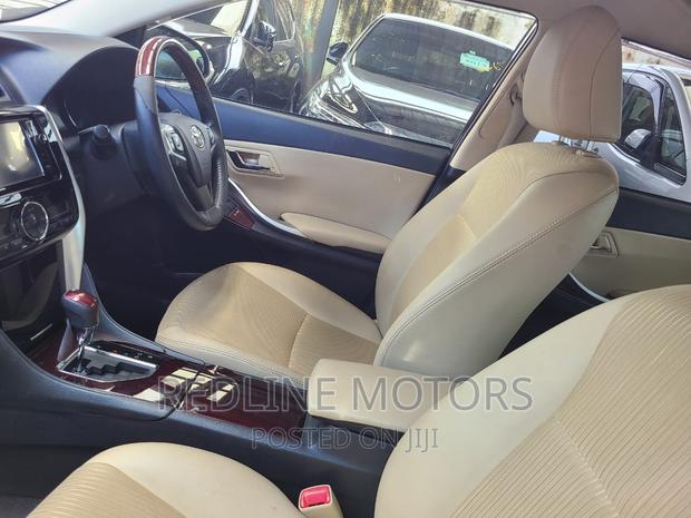 2016 Toyota Premio 1.5L Red FWD - Used with Pride