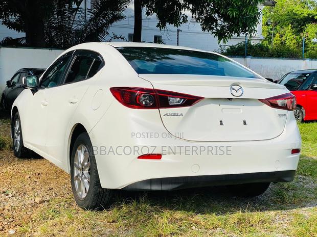 2016 Mazda Axela in Off-White: Minimum Two Options