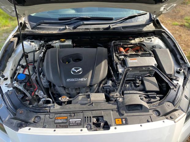 2016 Mazda Axela in Off-White: Minimum Two Options