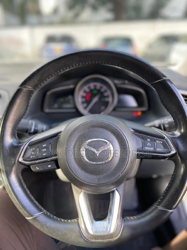 2016 Mazda Axela in Off-White: Minimum Two Options