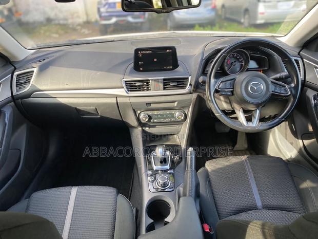 2016 Mazda Axela in Off-White: Minimum Two Options